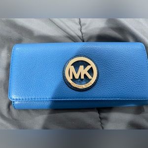 Michael Kors blue checkbook wallet with gold hardware